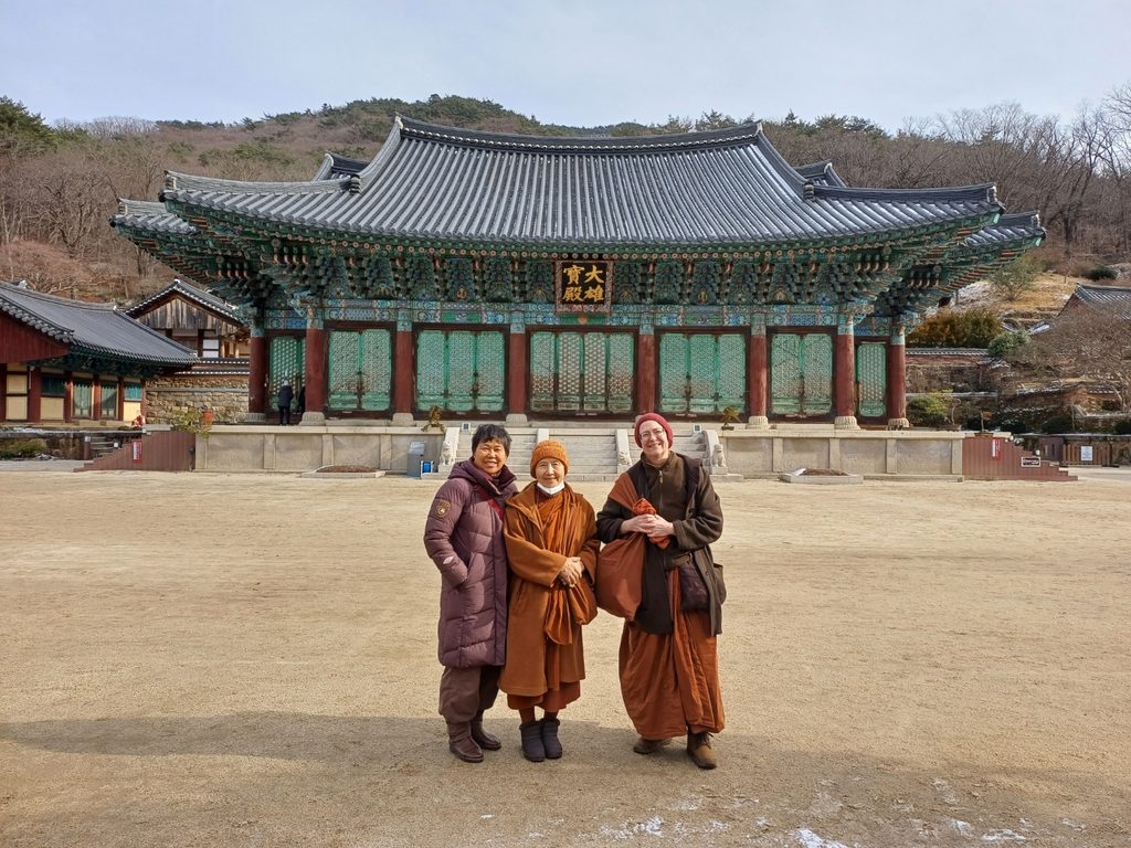 Sangha Treasure Temple w/ Soomi, Ayya Sucitta, and Ayya Niyyanika standing in front