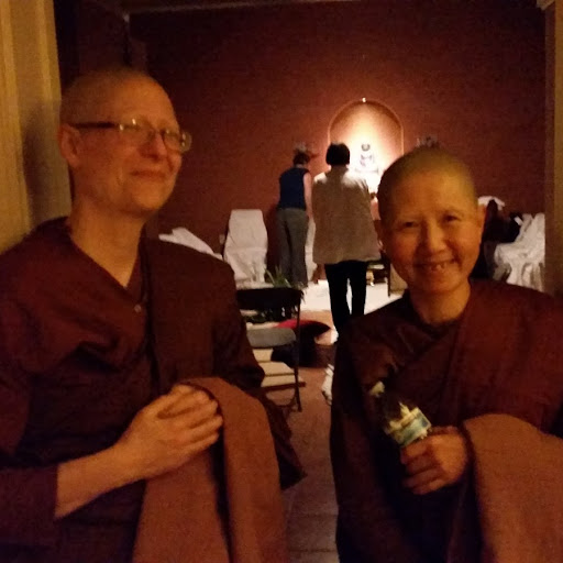 Ayya Niyyanika and Ayya Sucitta in doorway to Dhammadharini meditation hall